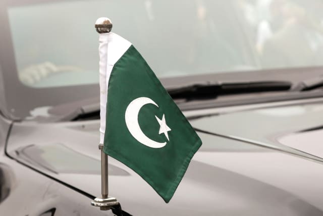  Pakistan's national flag is mounted on a vehicle of the Chief Minister of Sindh, as a convoy of vehicles is parked during a ceremony to celebrate Independence Day, in Karachi, Pakistan August 14, 2023 (photo credit: REUTERS/AKHTAR SOOMRO)