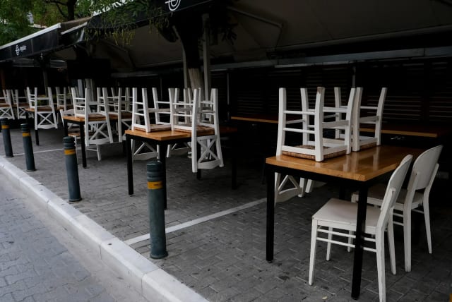  Illustrative image of a cafe being closed. Israel's hospitality and food industry was hit the hardest by the economic damages of the ongoing war with Hamas. (photo credit: SHUTTERSTOCK)