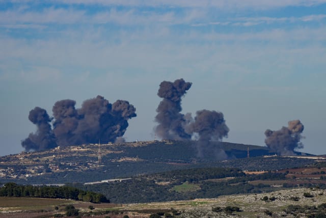 Smoke rises during an exchange of fire between the IDF and terrorists from the Hezbollah organization on December 16, 2023 (photo credit: AYAL MARGOLIN/FLASH90)
