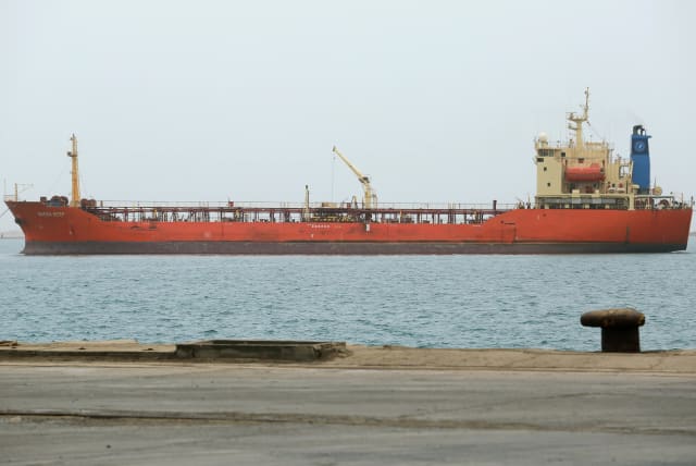  A ship is pictured at the Red Sea port of Hodeidah, Yemen August 5, 2018. (photo credit: ABDULJABBAR ZEYAD/REUTERS)