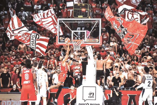  HAPOEL TEL AVIV fans made their presence known loud and clear in their return to the Drive-In Arena for the Reds’ 112-76 league victory over Hapoel Eilat (photo credit: YEHUDA HALICKMAN)