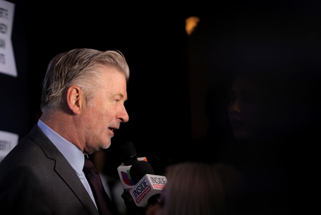  Alec Baldwin speaks as he attends the 2022 Robert F. Kennedy Human Rights Ripple of Hope Award Gala in New York City, U.S., December 6, 2022.  (photo credit: REUTERS/ANDREW KELLY)