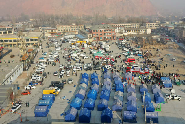  An aerial view shows emergency tents at Dahejia village amid rescue operations following the earthquake in Jishishan county, Gansu province, China December 19, 2023. (photo credit: CHINA DAILY VIA REUTERS)