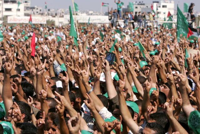  Palestinian Hamas supporters attend a Hamas rally in Gaza October 6, 2006. (photo credit: SUHAIB SALEM/REUTERS)