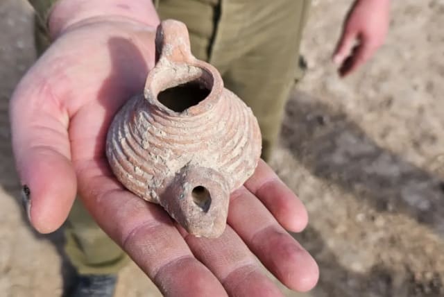 "It was covered in mud, I cleaned it and called the Antiquities Authority," soldiers said of their   (photo credit: ISRAEL ANTIQUITIES AUTHORITY.)