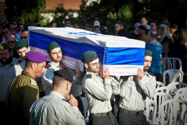 IDF funerals are becoming an almost-daily practice since Israel's ground invasion of Gaza began (photo credit: AVSHALOM SASSONI/FLASH90)