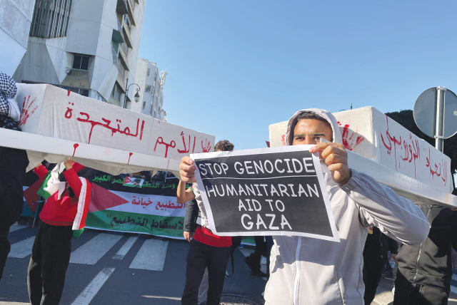  PROTESTERS call for an end to Morocco's ties with Israel, in Rabat, last week. Morocco's decision to keep its ambassador in Tel Aviv, despite the fact that the Israeli mission staff was evacuated from Rabat, is a significant statement, says the writer. (photo credit: REUTERS/Ahmed El Jechtimi)