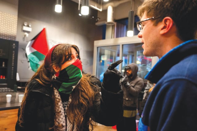  MEMBERS OF Chicago Youth Liberation for Palestine protest at a local Starbucks coffeehouse on Sunday, amid anti-Israel protests across the US. (photo credit: Vincent Alban/Reuters)