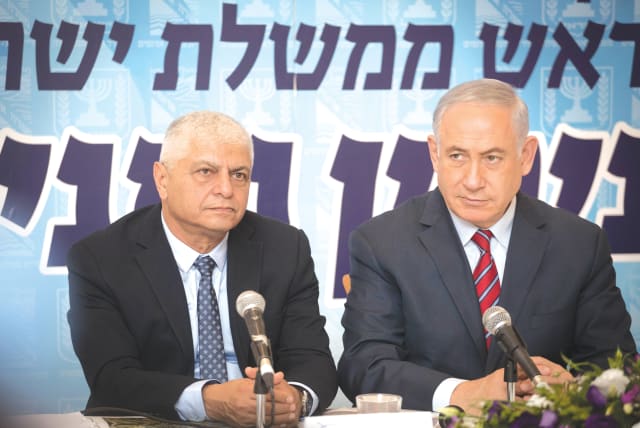  PRIME MINISTER Benjamin Netanyahu and Ma’aleh Adumim mayor Benny Kashriel attend a Likud meeting in Ma’aleh Adumim, in 2017. (photo credit: HADAS PARUSH/FLASH90)