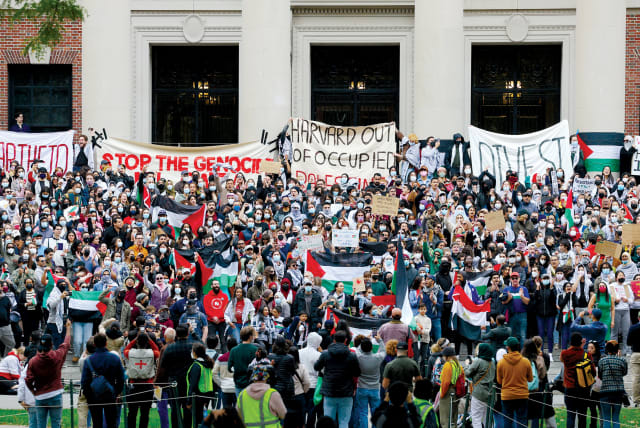  Demonstrators take part in an Emergency Rally: Stand with Palestinians Under Siege in Gaza at Harvard University on October 14, 2023. (photo credit: BRIAN SNYDER/REUTERS)
