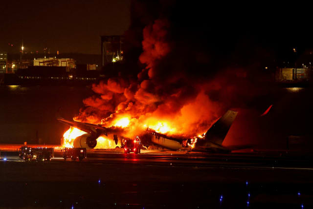  Japan Airlines' A350 airplane is on fire at Haneda international airport in Tokyo, Japan January 2, 2024. (photo credit: REUTERS/Issei Kato/File Photo)