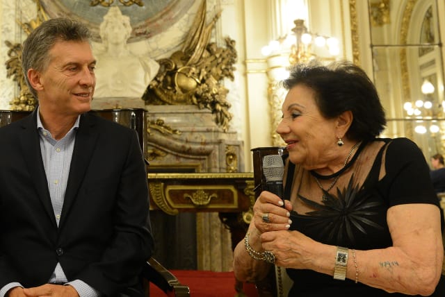  President Mauricio Macri with Eugenia Unger, 82, one of the survivors of the Shoá who told her personal story. 2016 (photo credit: Casa Rosada Argentina/Wikimedia Commons)