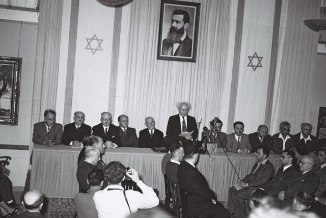  DAVID BEN-GURION reads the Declaration of Independence of the State of Israel in Tel Aviv on May 14, 1948. (photo credit: HANS PINN/GPO)