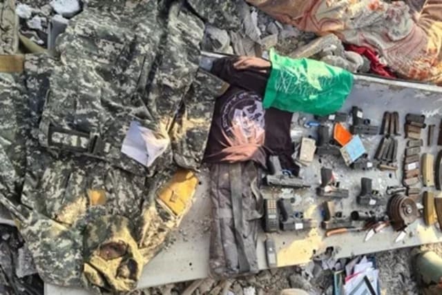  Israeli forces seize Hamas weaponry in Gaza's high-rise district, January 5, 2024 (photo credit: IDF SPOKESPERSON'S UNIT)