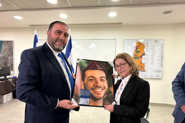  Moshe Arbel posthumously awards Israeli citizenship to fallen soldier Valentin Elie Ghnassia. (photo credit: Courtesy)