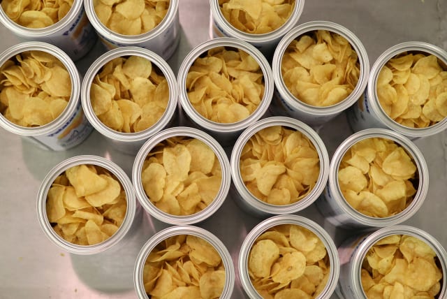 Cans of potatoes are pictured inside Bonilla a la Vista factory in Arteixo, near Coruna, Spain February 18, 2020. (photo credit: NACHO DOCE/REUTERS)