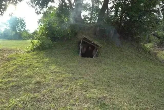  This is what it looks like when she enters the cave house she carved (photo credit: @PrimitiveSurvivalLife)
