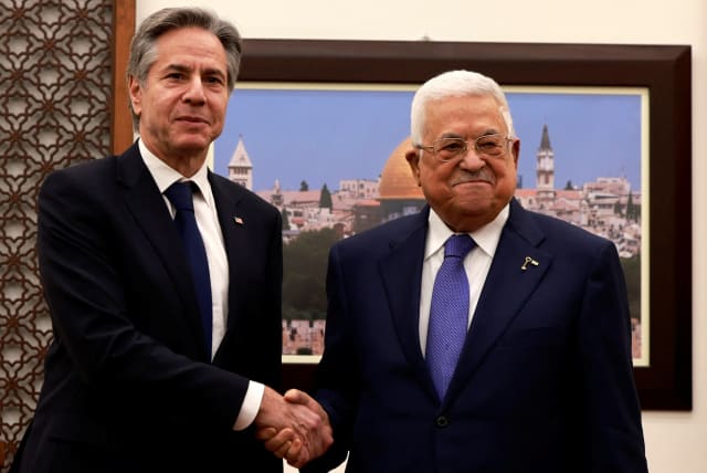 US Secretary of State Antony Blinken meets with Palestinian President Mahmoud Abbas, during his week-long trip aimed at calming tensions across the Middle East, in the Muqata'a, in Ramallah in the West Bank on January 10, 2024 (photo credit: JAAFAR ASHTIYEH/Pool via REUTERS)