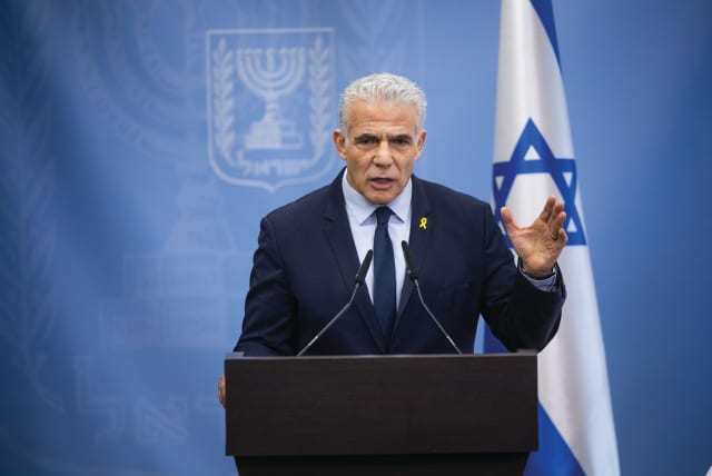  OPPOSITION LEADER Yair Lapid addresses a meeting of his Yesh Atid party’s Knesset faction on Monday. (photo credit: YONATAN SINDEL/FLASH90)