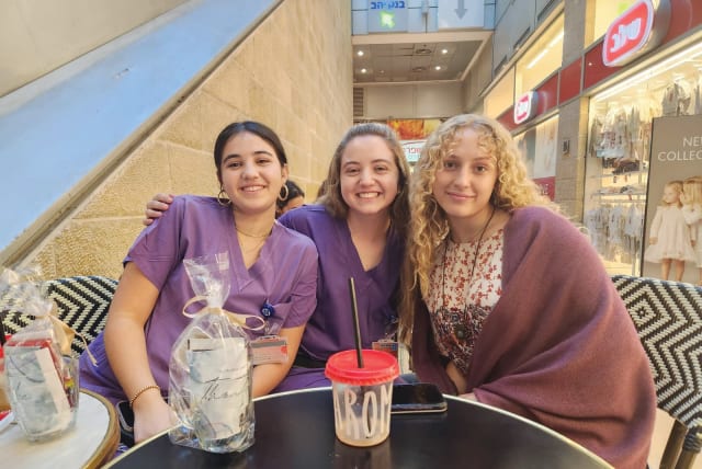  Two current B'not Sherut who work at Hadassah Ein Kerem are visited by Devora Ruderman (R) of the Michael Levin Base (photo credit: The Michael Levin Base)