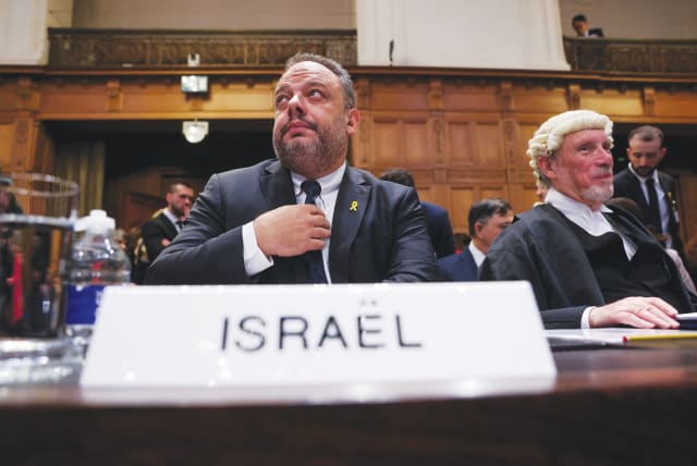 ISRAEL FOREIGN MINISTRY legal adviser Tal Becker and British barrister Malcolm Shaw KC, who appeared on behalf of Israel, attend the International Court of Justice hearing, in The Hague. (photo credit: THILO SCHMUELGEN/REUTERS)