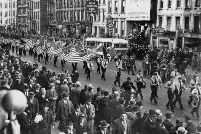 German American Bund parade in New York City on East 86th St. between First and Second Avenues, Oct. 30, 1937 / World-Telegram photo. (photo credit: PUBLIC DOMAIN)
