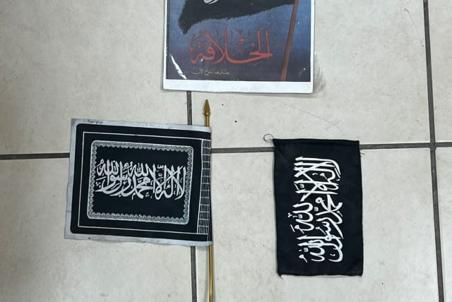  ISIS flags found at the house of the terrorists. (photo credit: POLICE SPOKESPERSON'S UNIT)