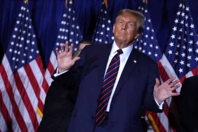  Former US President Donald Trump gestures in Nashua, New Hampshire, January 23, 2024 (photo credit: REUTERS/MIKE SEGAR)