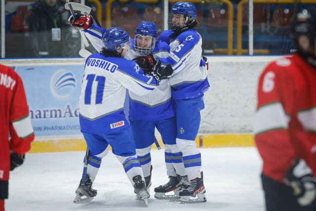  TEAM ISRAEL players celebrate after one of their seven goals in the 7-3 victory over host Bulgaria at the IIHF U20 World Championship on Tuesday night to improve to 2-0 at the tournament. (photo credit: Courtesy)