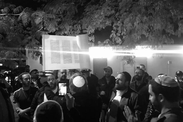  The Olim community of JTLV celebrates the writing of a Torah scroll at an army base at the Gaza border (photo credit: Shimon Rosen)