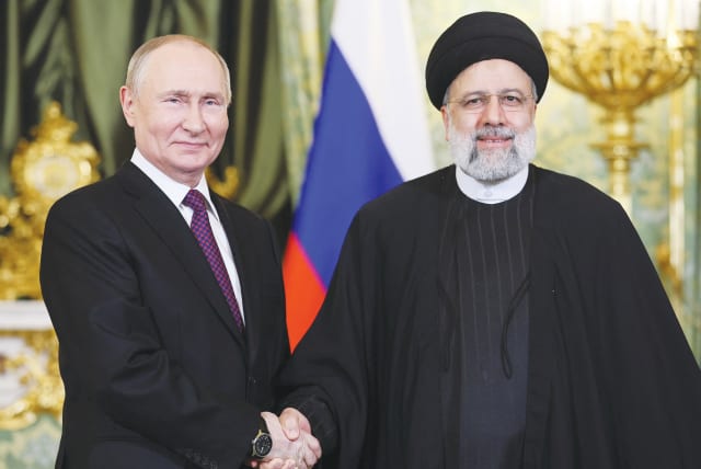 The Russian and Iranian Presidents meet in Moscow last month. Increasingly, Tehran is acting not just as an ally but as a proxy for Russia in the Middle East, much as it has its own regional proxies, the writers maintain. (photo credit: SPUTNIK/REUTERS)