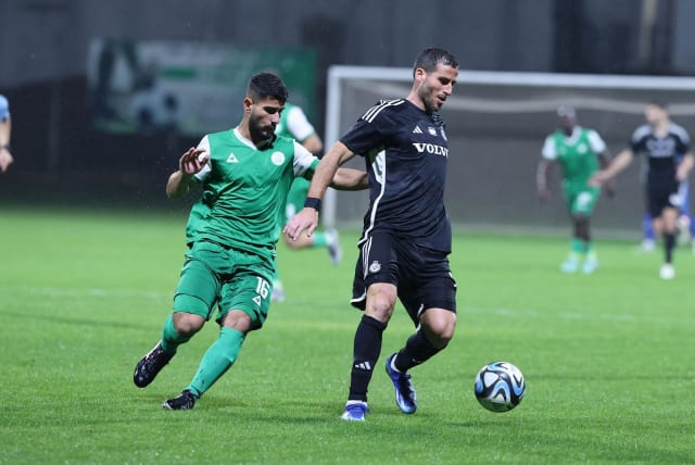  TOMER HEMED (in black) and Maccabi Haifa come on strong late in their State Cup round-of-32 clash with Hapoel Kfar Saba, claiming three goals in the extra session for a 6-3 victory.  (photo credit: Maccabi Haifa/Courtesy)
