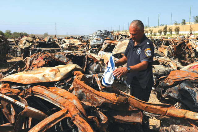  A SEARCH is held for human remains and other evidence among many destroyed vehicles in a field near Netivot, after the October 7 massacre by Hamas. Those calling for an end to the fighting have clearly forgotten that there was a ceasefire in place until the morning of October 7, the writer argues. (photo credit: RONEN ZVULUN/REUTERS)