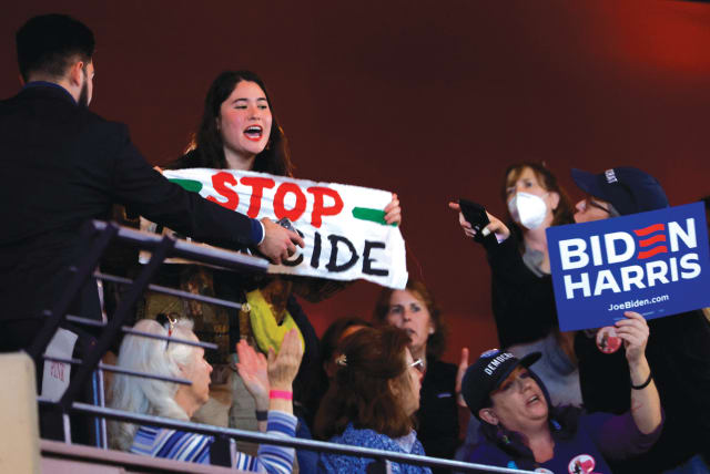  A PRO-PALESTINIAN protester, holding a ‘Stop genocide’ banner, interrupts US President Joe Biden during a presidential campaign event in Virginia last week (photo credit: REUTERS/EVELYN HOCKSTEIN)