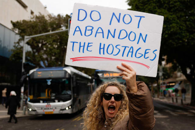  A woman takes part in a protest demanding a hostage deal, in Tel Aviv, Israel, February 1, 2024 (photo credit: REUTERS/SUSANA VERA)