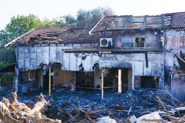  THE DESTRUCTION at Kibbutz Be’eri after the October 7 massacre: AN UNRWA elementary school teacher has been accused of being a Hamas commander and of having participated in the massacre at the kibbutz. (photo credit: MOSHE SHAI/FLASH90)