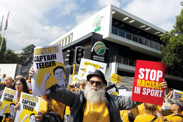  People protest outside Cricket South Africa (CSA) headquarters on January 18 after the removal of David Teeger as captain of the South African Under-19 team.  (photo credit: Alet Pretorius/Reuters)