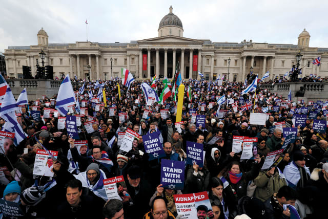   People attend the We Stand With Israel rally to express solidarity with the Jewish state, marking the 100th day since the October 7 attack by Hamas, London’s Trafalgar Square, January 14. (photo credit: REUTERS/Belinda Jiao)
