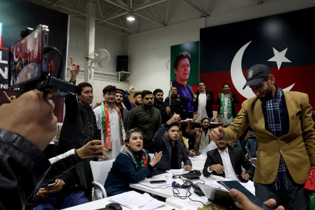  Pakistan Tehreek-e-Insaf (PTI) supporters watch the general election results at a PTI office in Islamabad, Pakistan February 8, 2024.  (photo credit:  REUTERS/Gabrielle Fonseca Johnson)