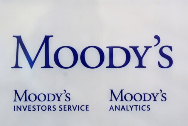  The logo of credit rating agency Moody's Investor Services is seen outside the office in Paris (photo credit: REUTERS/PHILIPPE WOJAZER)