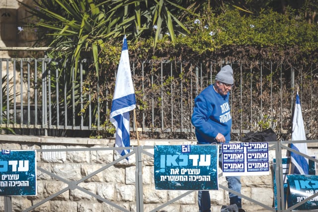  IDF COL. (res.) Rami Matan protests near the home of Prime Minister Benjamin Netanyahu, in Jerusalem, last year, against the government’s judicial reform plan. (photo credit: YONATAN SINDEL/FLASH90)