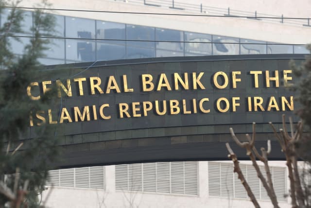  The sign of the Central Bank of the Islamic Republic of Iran is seen in Tehran, Iran January 25, 2023. (photo credit: Majid Asgaripour/WANA (West Asia News Agency)/Handout via REUTERS)