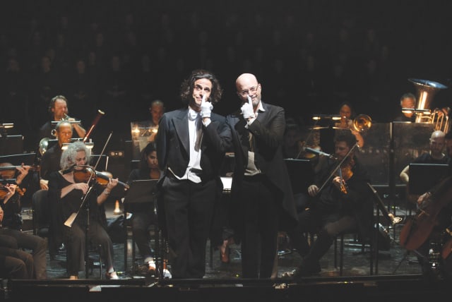  ACTOR BEN PERRY (left) and conductor Roee Oppenheim in Monty Python’s ‘Passion.’  (photo credit: MOSHE CHITAYAT)