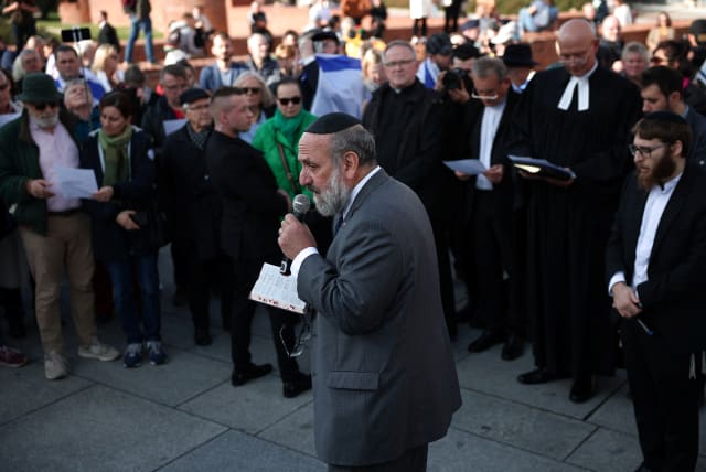  The Chief Rabbi of Poland, Michael Schudrich, leads a multi-confessional prayer for peace after terrorists from Hamas entered Israeli territory on Saturday, at Old Town in Warsaw, Poland, October 13, 2023. (photo credit: KACPER PEMPEL/REUTERS)
