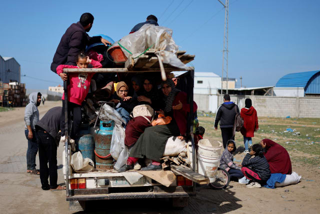  Palestinians arrive in Rafah after they were evacuated from Nasser hospital in Khan Younis due to the Israeli ground operation, amid the ongoing conflict between Israel and Hamas, in the southern Gaza Strip, February 15, 2024. (photo credit: MOHAMMED SALEM/REUTERS)