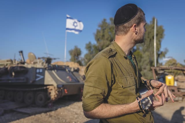  IDF FATIGUES: Color may be drab, but it resonates with our collective hopes.  (photo credit: Chaim Goldberg/Flash90)