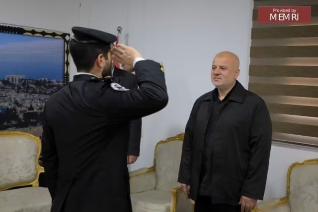 Officer Nasrallah salutes the Undersecretary of Hamas' Interior Ministry, General Nasser Maslah (ruc.edu.ps, March 13, 2023) (photo credit: MEMRI)