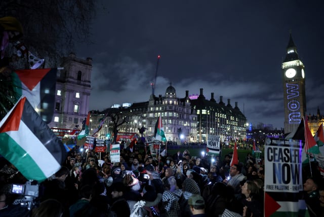 People demonstrate on the day of a vote on the motion calling for an immediate ceasefire in Gaza, amid the ongoing conflict between Israel and the Palestinian terrorist group Hamas, in London, Britain, February 21, 2024. (photo credit: REUTERS/Isabel Infantes)