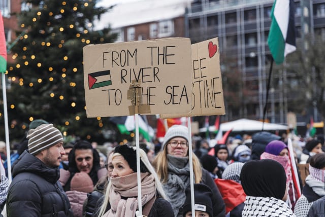  A PROTEST organized by Palestinian solidarity groups and activists takes place in Copenhagen last month. The genocidal calls of ‘from the river to the sea, Palestine will be free’ are accompanied by massively financed and marketed Palestinian paraphernalia, scarves, flags, and posters. (photo credit: Ritzau Scanpix/Reuters)