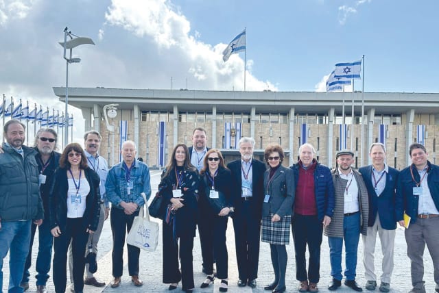  MEMBERS OF the Middle East Forum fact-finding delegation, including the writer – sixth from the left – pose outside the Knesset during their visit earlier this month. (photo credit: Courtesy Middle East Forum)